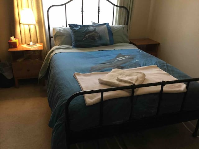 Private bedroom in a tree lined street