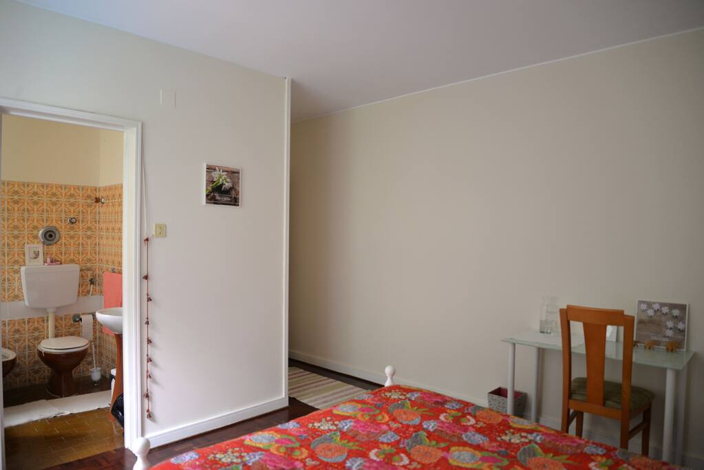 Room with double bed and private toilet