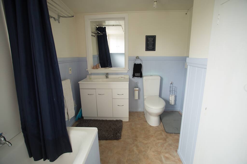 Bathroom with shower over bath