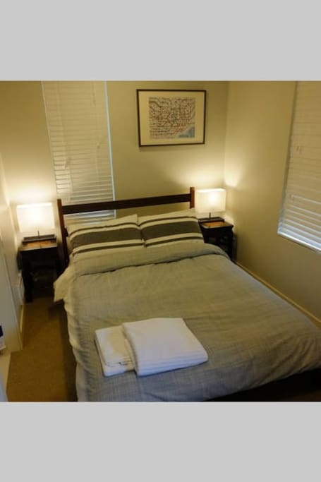 Nice full size bed with gel foam mattress top, thick duvet, and comfy sheets.