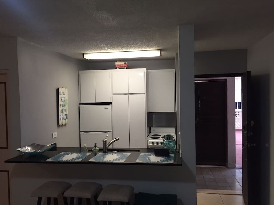 Kitchen, stove with oven, microwave, george forman grill new refrigerator yesss with cool beers just waiting for you. Kitchen is almost equipped plate, glasses, wine utensils ect. Alway something is missing that is because I never say full equip.