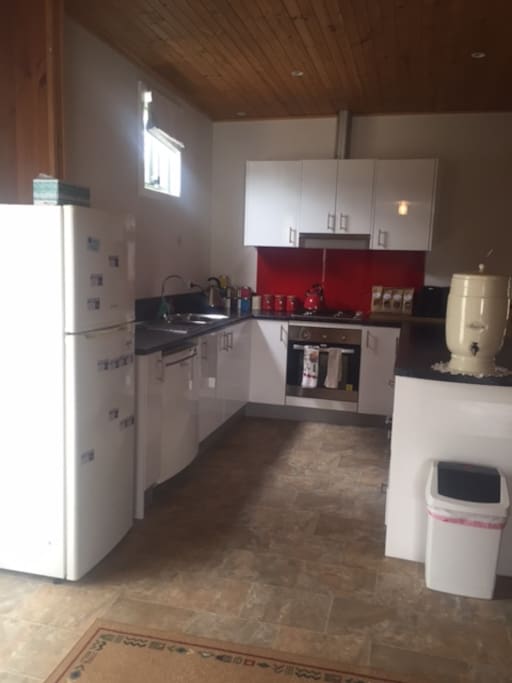 Full kitchen with dishwasher, gas cooking