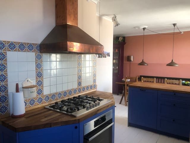 Bright, colorfull and quiet two story apartment