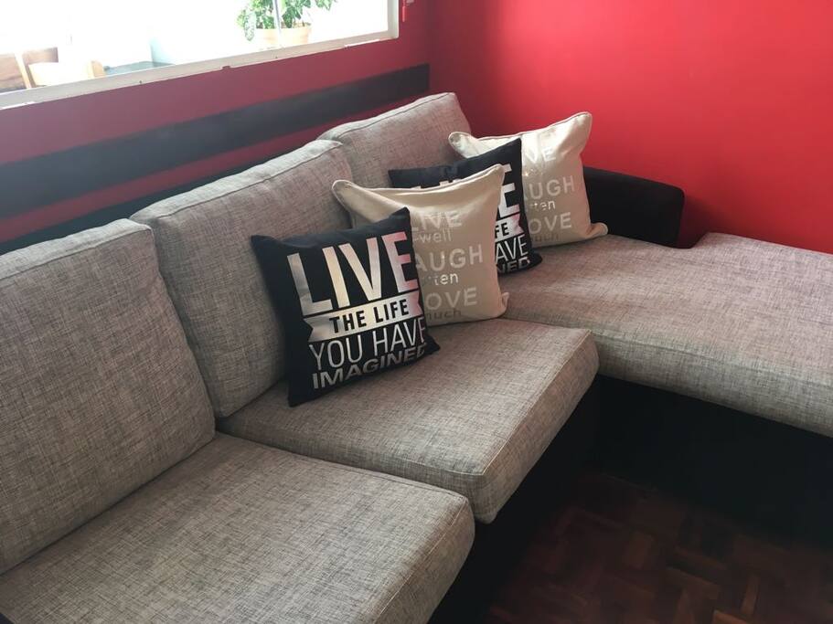 Sofá en L del living