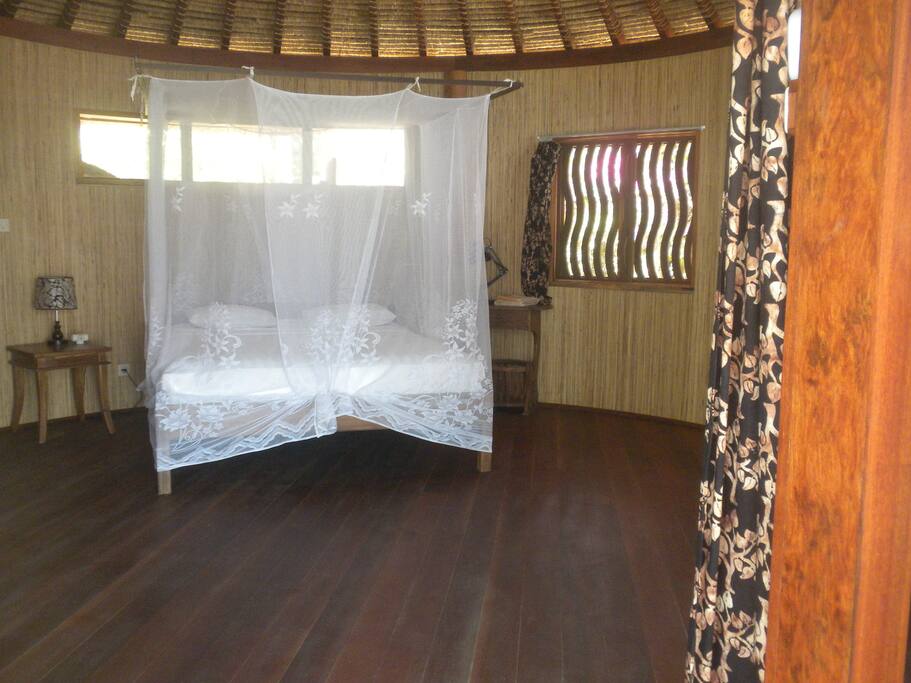 It's difficult to do justice to a round structure with a photo. All timber and bambu, real comfortable feeling inside