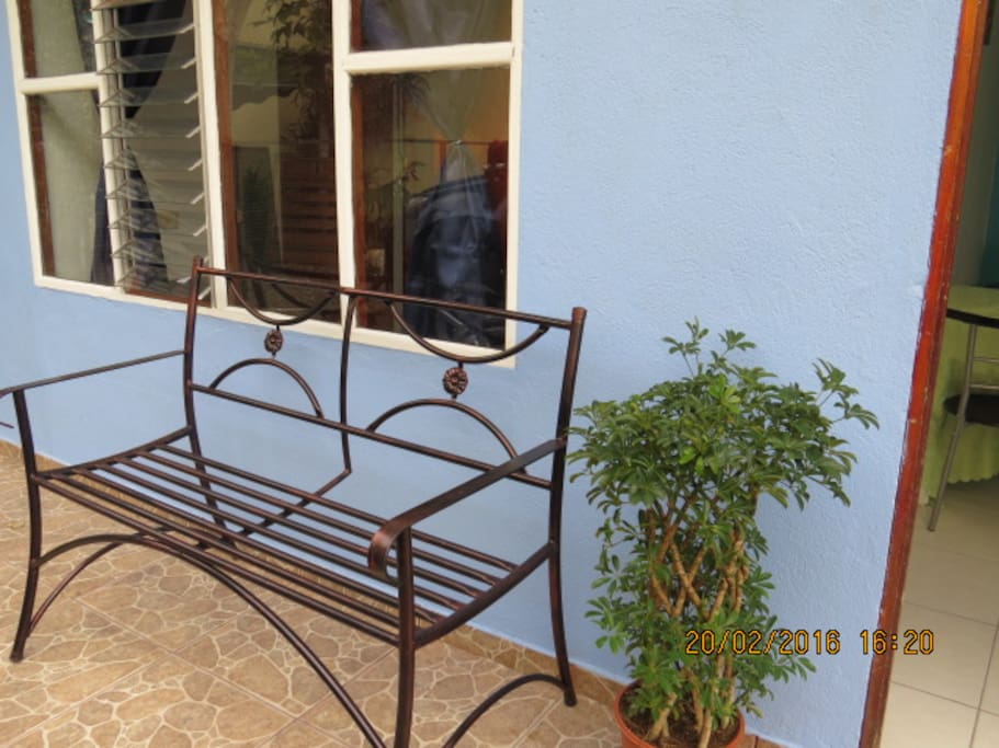 Wrough iron bench. Perfect for taking some air and reading spot!