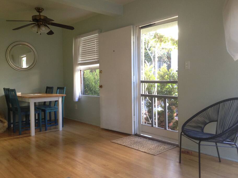 entryway looking into dining and workspace alcove