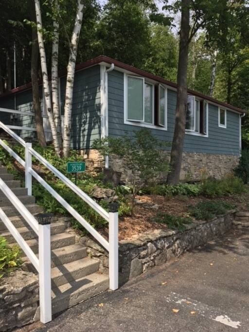 Our home is nestled in the cliff with a great view above the harbor.