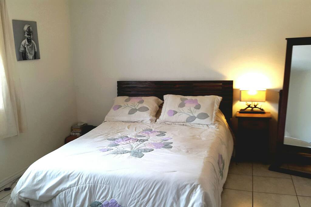 Master bedroom with walk in closest and ensuite bathroom