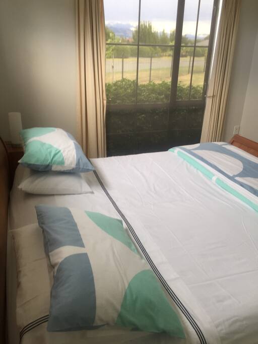 Bedroom has lovely view to Mt Grey.