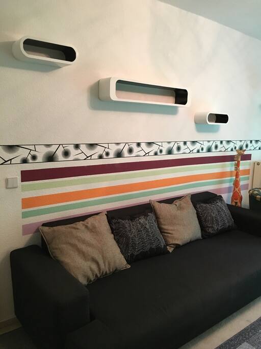 Zimmer 1/ room 1: fold-out sofa (bed 140x200) and small seating area