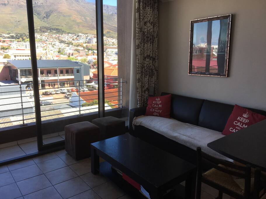The lounge. This couch folds into a double bed.