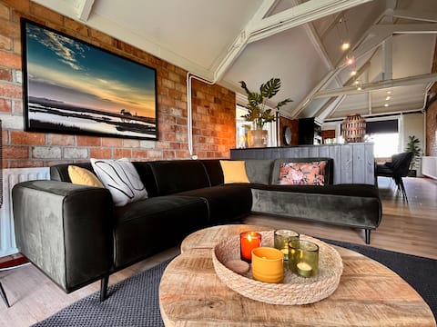 Top performing Airbnb: Stolpboerderij Noorderwind 18 people on Texel in Wijk 01 Het Nieuwe Land
