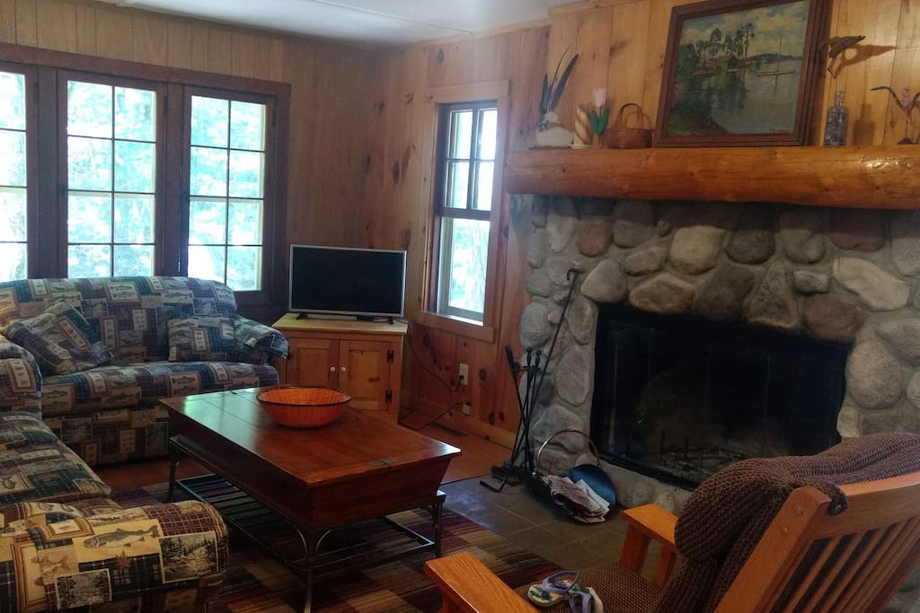 Living room includes wood burning fireplace (free wood)