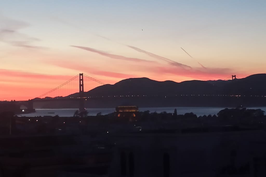 Beautiful views of Golden Gate Bridge, Palace of Fine Arts, San Francisco Bay, and gorgeous sunsets from master bedroom and shared roof space.