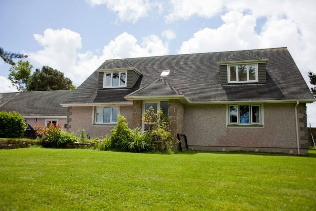 A detached 4 bedroom home with private heated swimming pool, hot tub and parking for up to 4 cars.