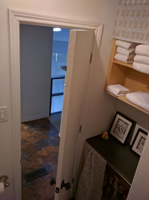 Upstairs bath towel cabinet