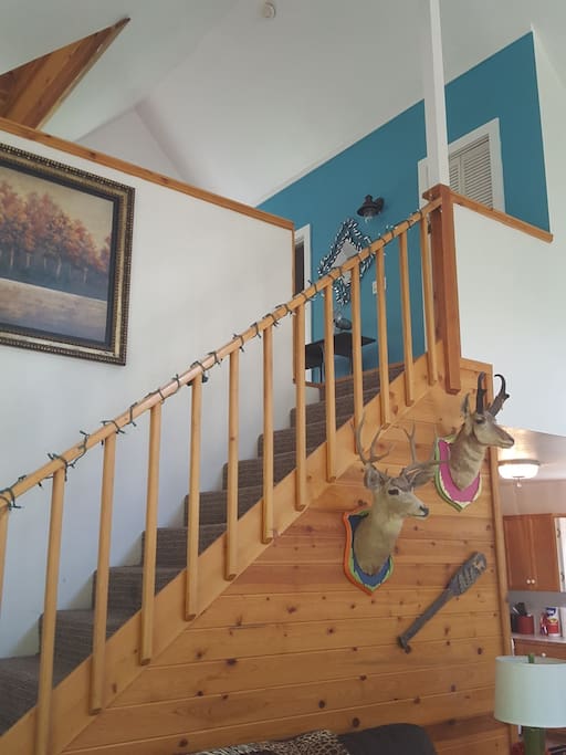 stairs going to loft bedroom and bath