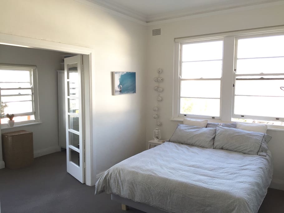 Master bedroom and opening to sunroom