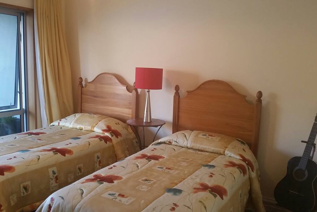 bedroom with direct access to lakefront walkway to qtown