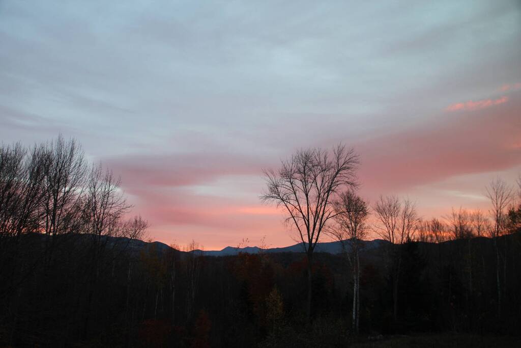 Sunrise over the mountains in the backyard.