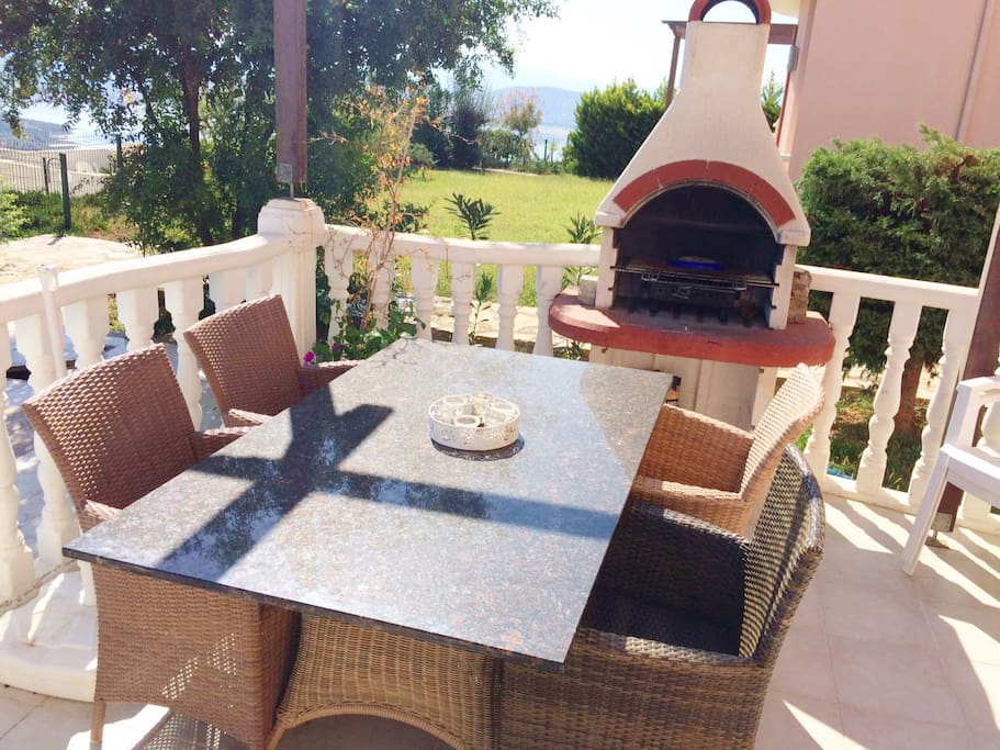 A stone built barbeque on your terrace