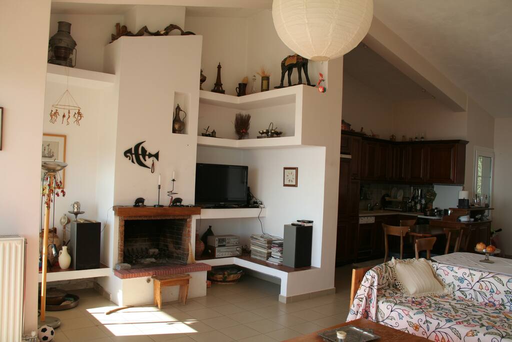 The living room and the fireplace.
