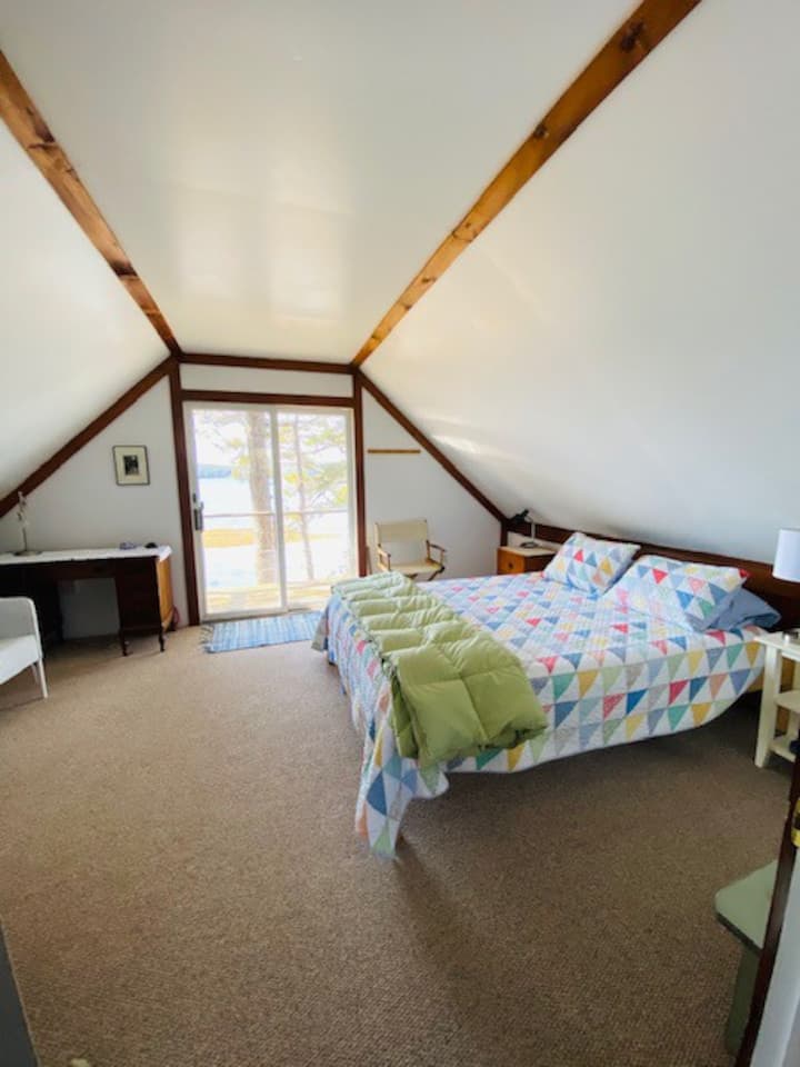 Master bedroom 2nd floor with sliding glass door to private oceanside deck