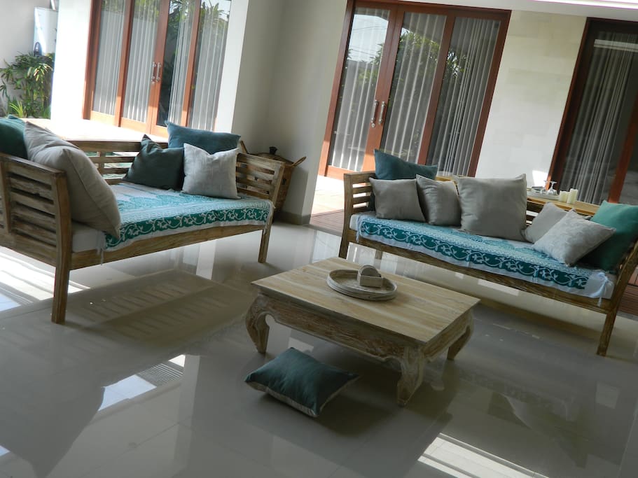 Living area styled with coastal hues.