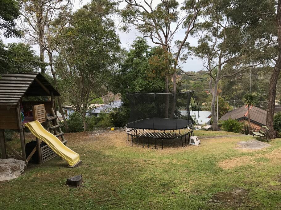 Rear Yard Trampoline & Treehouse