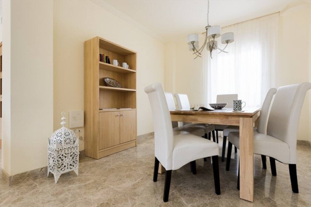 Dining table to seat six - extra chairs available