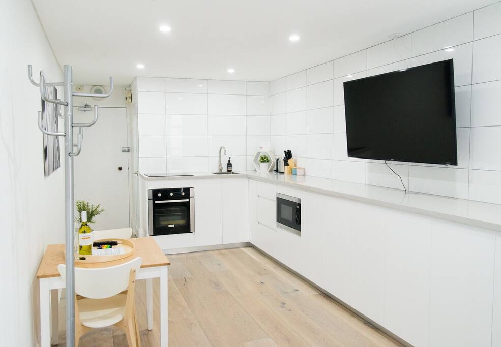 Cooking facilities (oven, stove, sink, microwave) and plenty of storage space