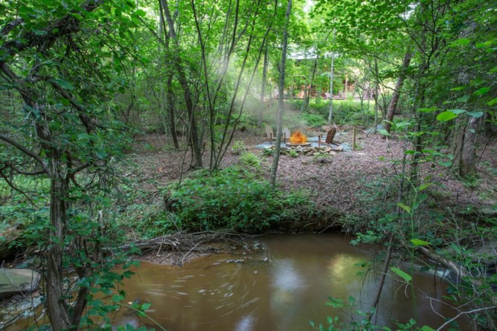 Peaceful creek running along the fire pit area