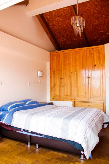 Bed for two with big wardrobe.