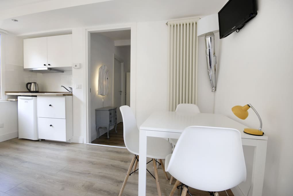 Living room with kitchen and table