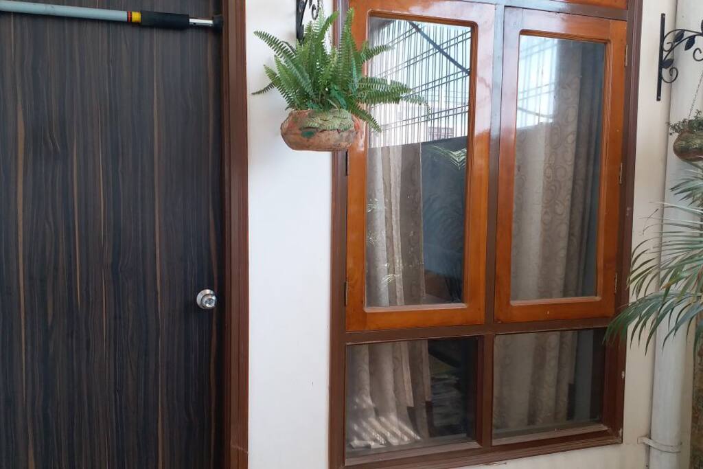 Another door and window of the room