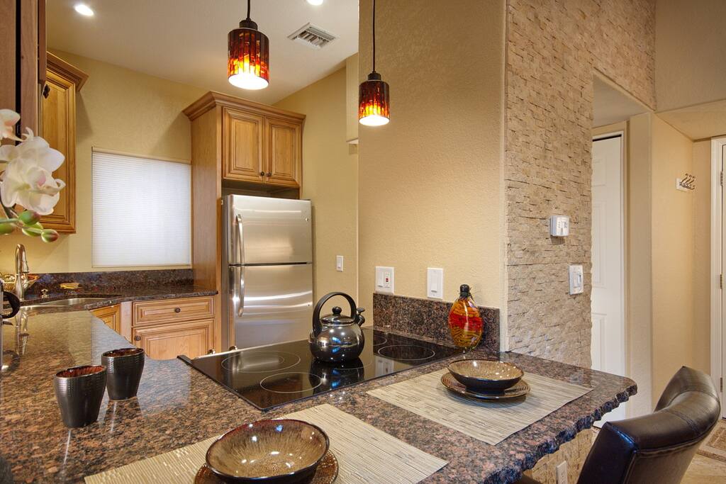 Granite Kitchen with Bar Overhang