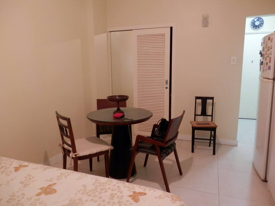 Refrigerator, table with chairs, private bathroom