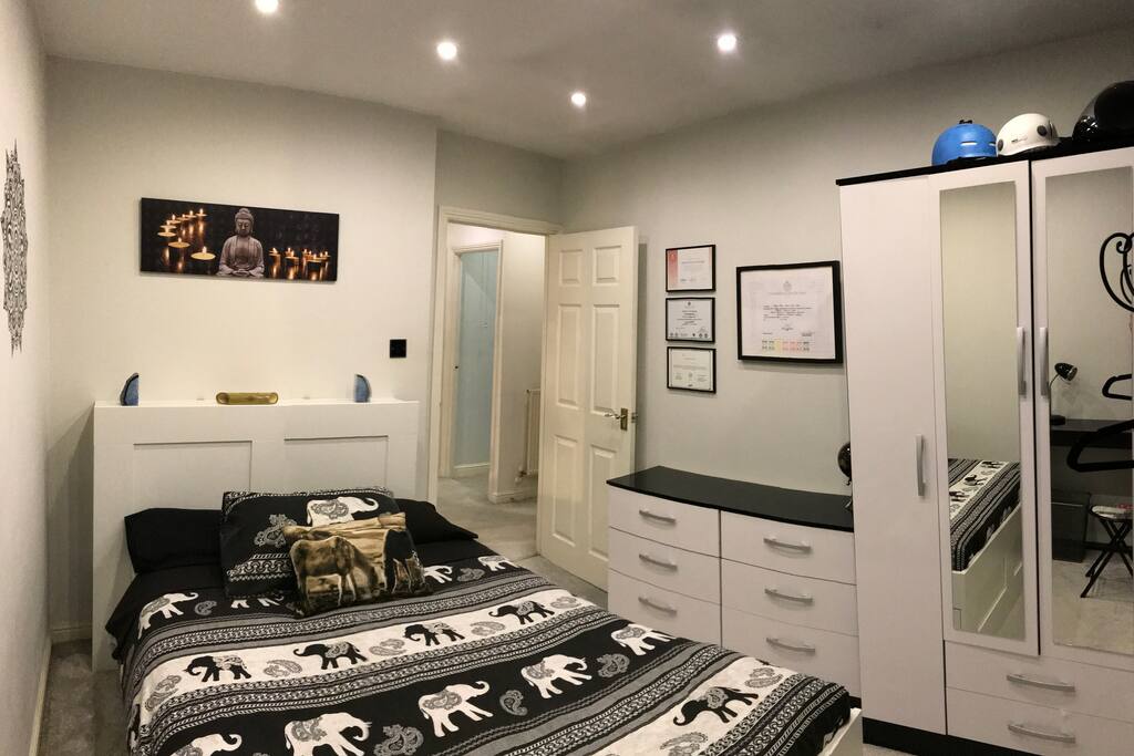 Spacious double bedroom with new bed.