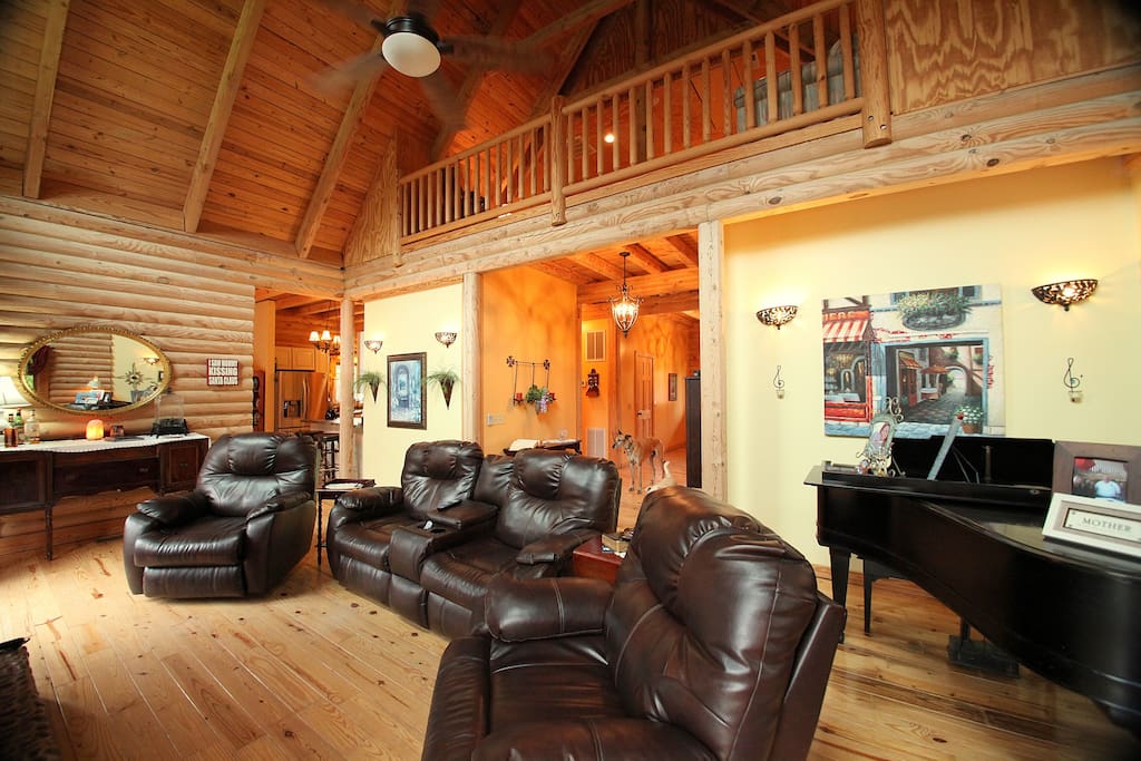 This massive great room is a lovely place to spend enjoying a nice cup of hot chocolate, watching tv or playing the baby grand piano, if you are so inclined.
