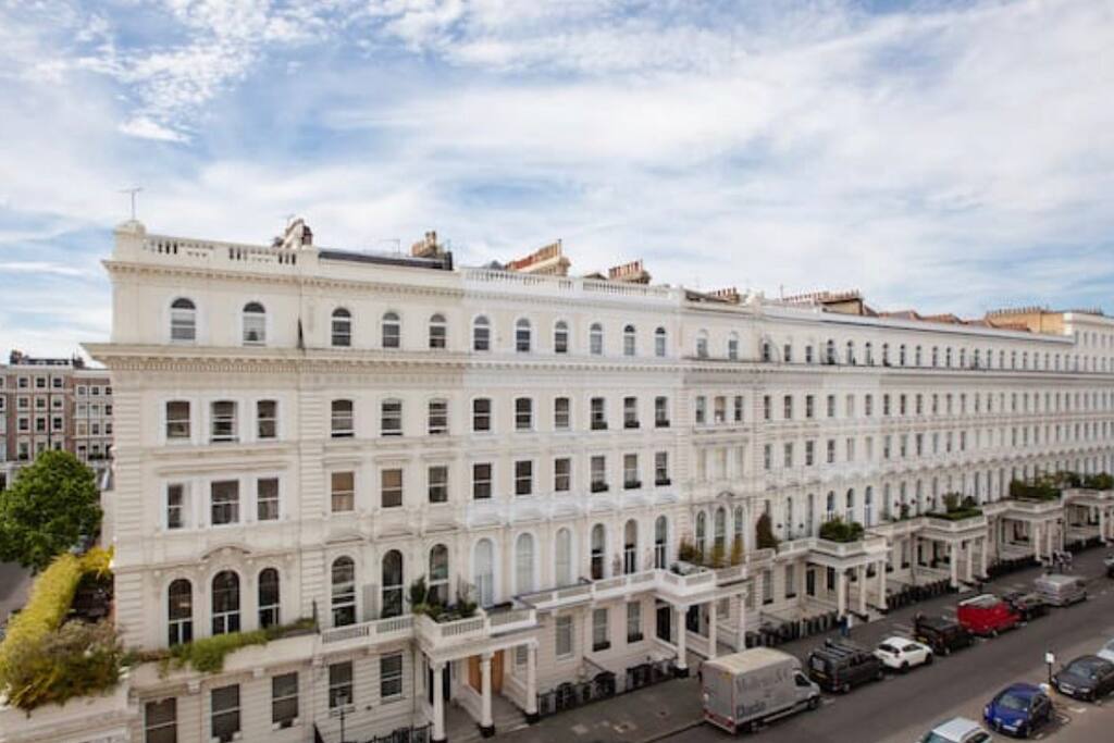 View from the sitting room to Queen Gate Terrace. Our building is similar to the one you see and we're on the top. It's beautiful, light and very quiet for the area!