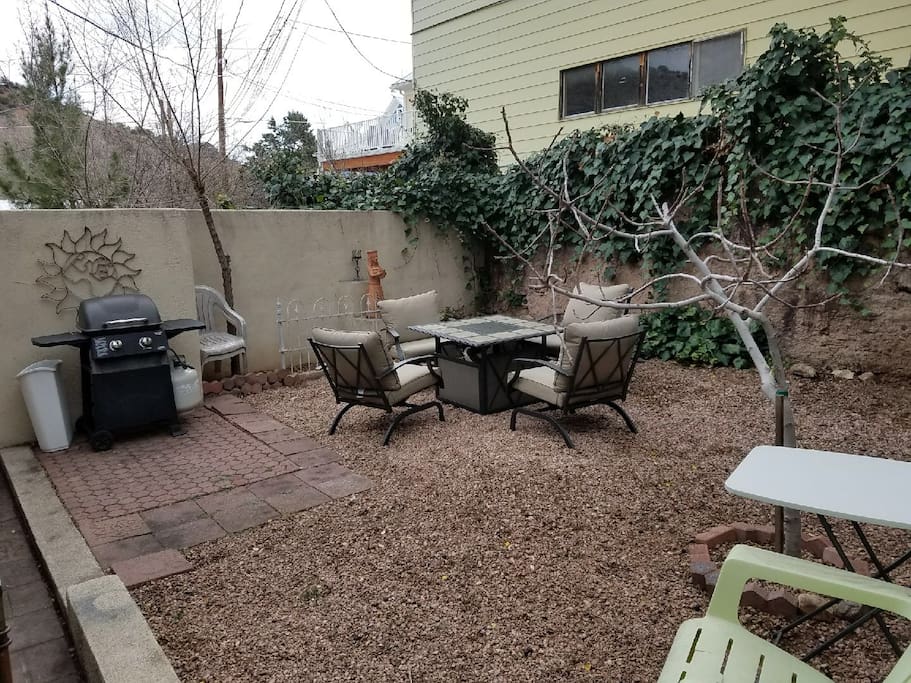 Back yard equipped with propane grill & fire pit