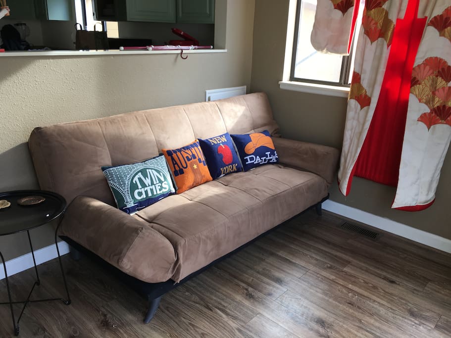 The futon in the den/TV room opens to a full-size bed.
