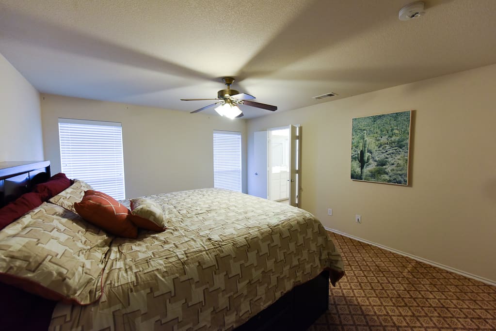 Master bedroom with King bed and storage drawers in the bed