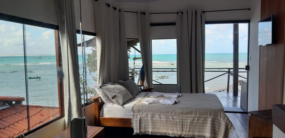 Casa em frente ao mar.