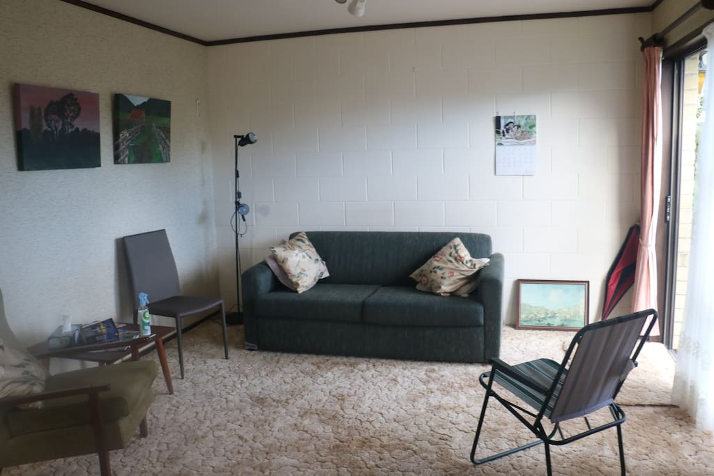 Lounge with suite & chair Coffee Table & reading lamp.