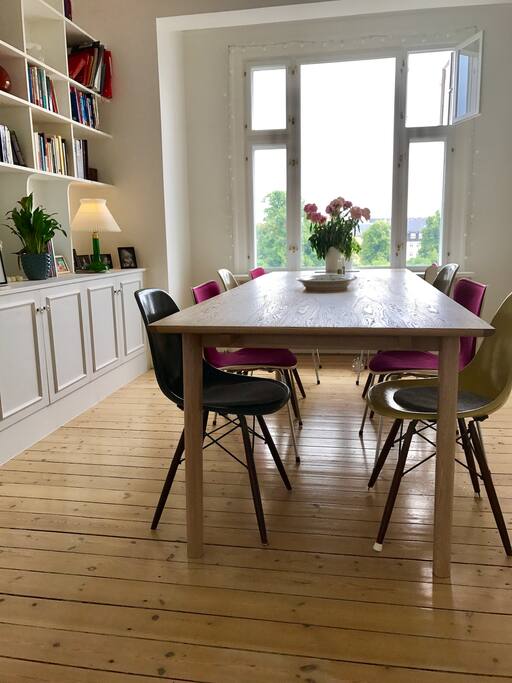 Dining room opens up through double doors to living room
