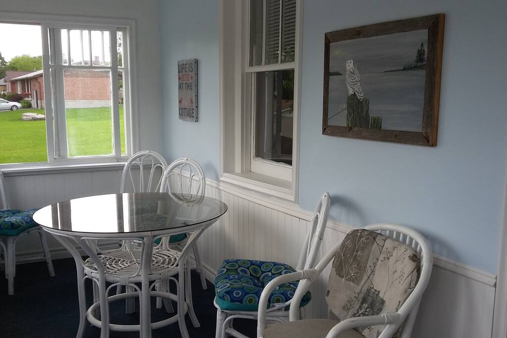 Enclosed Sunporch with a view to the river.