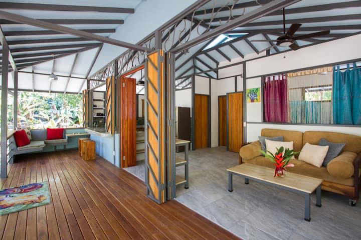 The living space has the option to be completely open and is designed for lounging on either of the two comfy couches and the double the hammock area.  Wildlife viewing from this deck is what this house is known for.