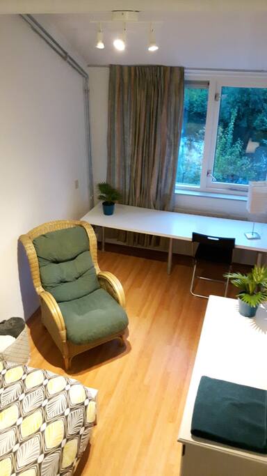 Large desk, with nice view towards the garden and the little lake.